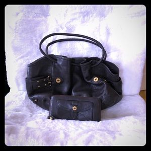 Cole Hann hand bag with matching wallet.